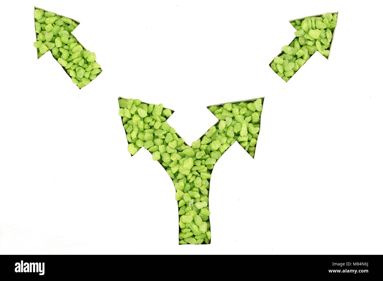 Le frecce verdi di un incrocio o simbolo di una decisione Foto Stock