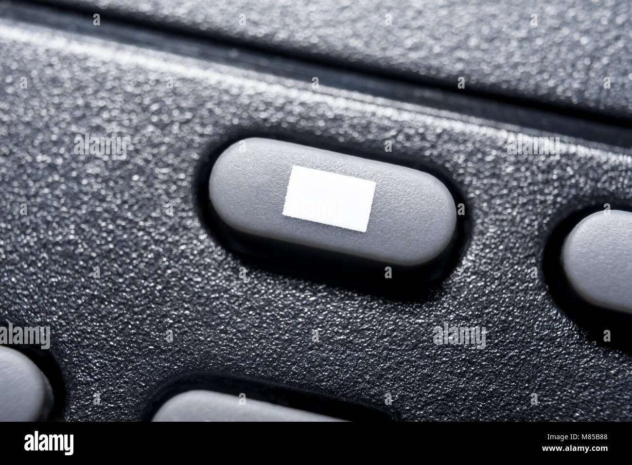 Macro di un nero pulsante Stop su Nero telecomando per un impianto hifi sistema Audio Stereo Foto Stock Macro di un nero pulsante Stop su Nero telecomando per un impianto hifi sistema Audio Stereo Foto Stock