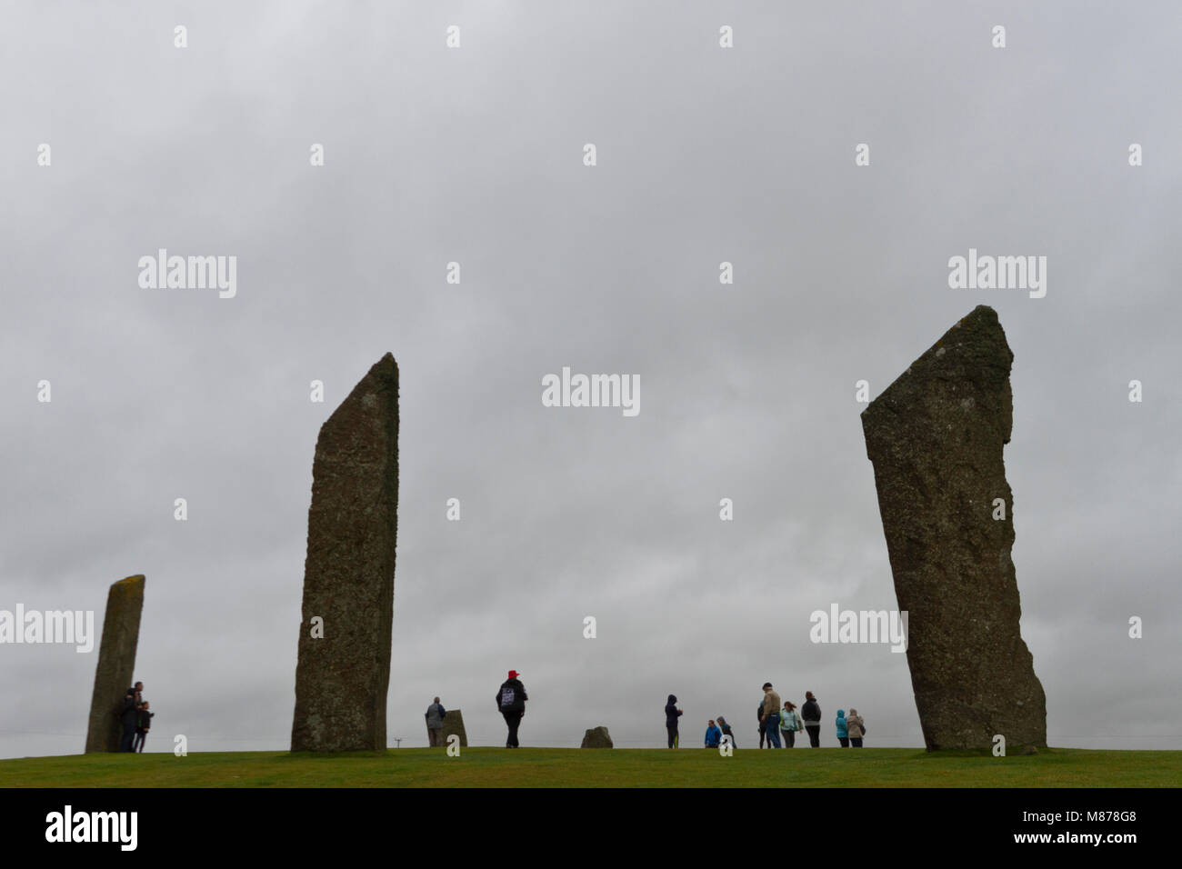 I turisti a pietre di Stenness, Orkney Foto Stock