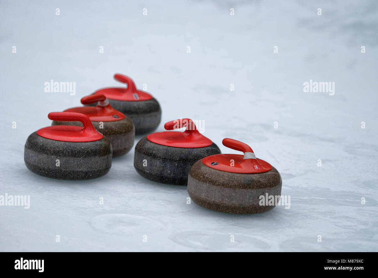 Giocare a curling su ghiaccio a Bryant Park - New York City Foto Stock