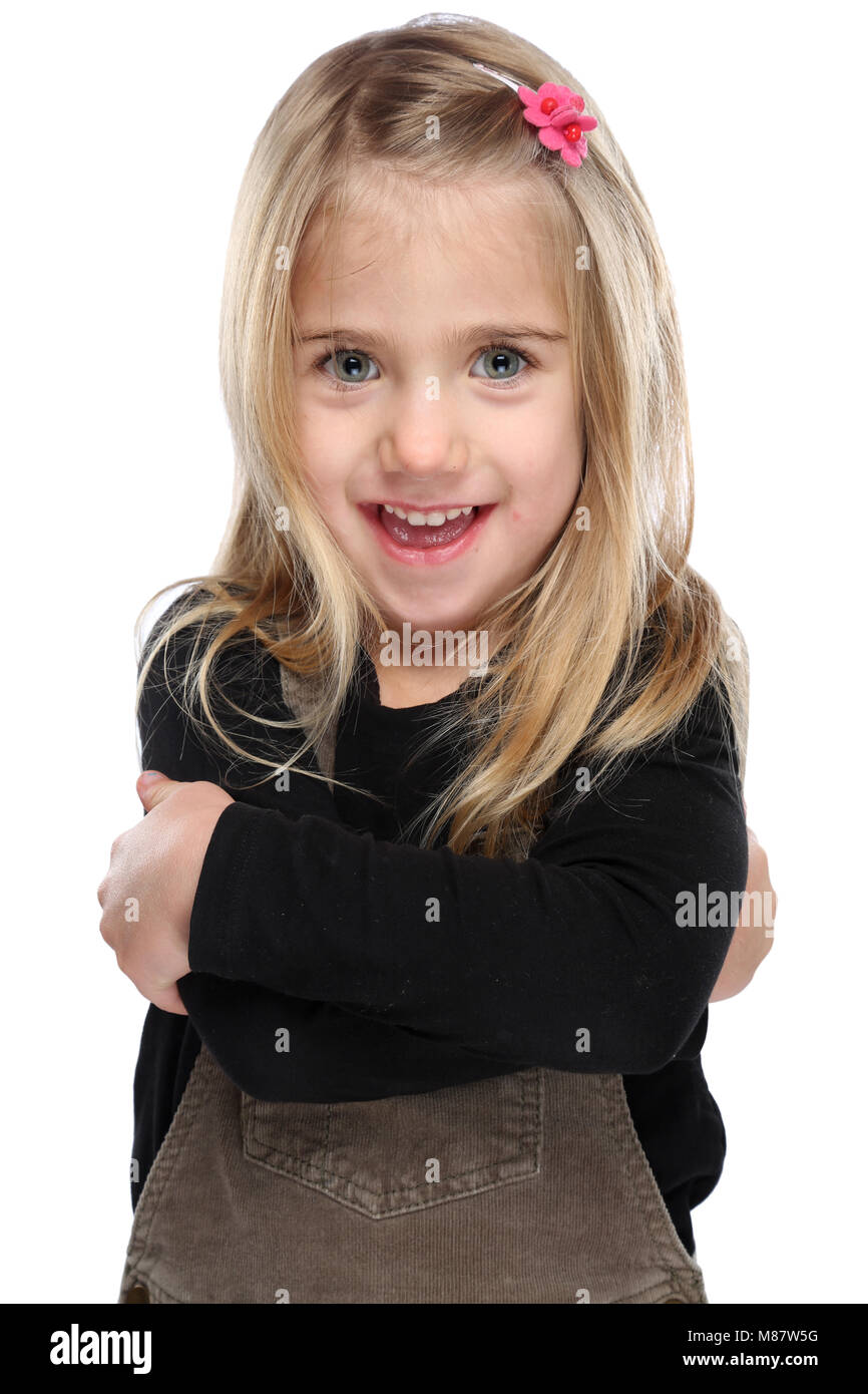 Bambini Bambino sorridente bambina corpo superiore ritratto isolato su uno sfondo bianco Foto Stock