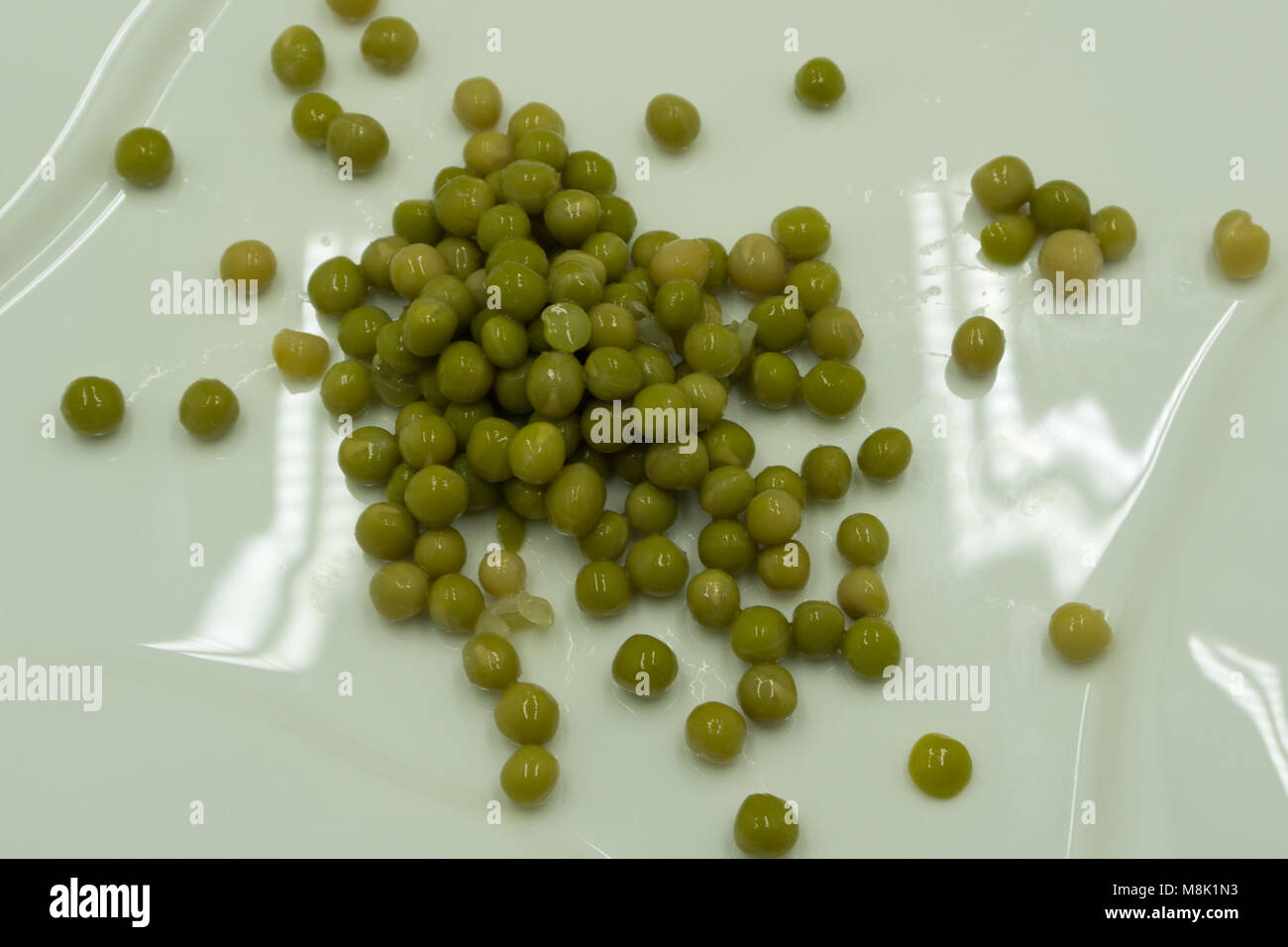 Essiccato di piselli verdi sacco semi guscio spellati Foto Stock