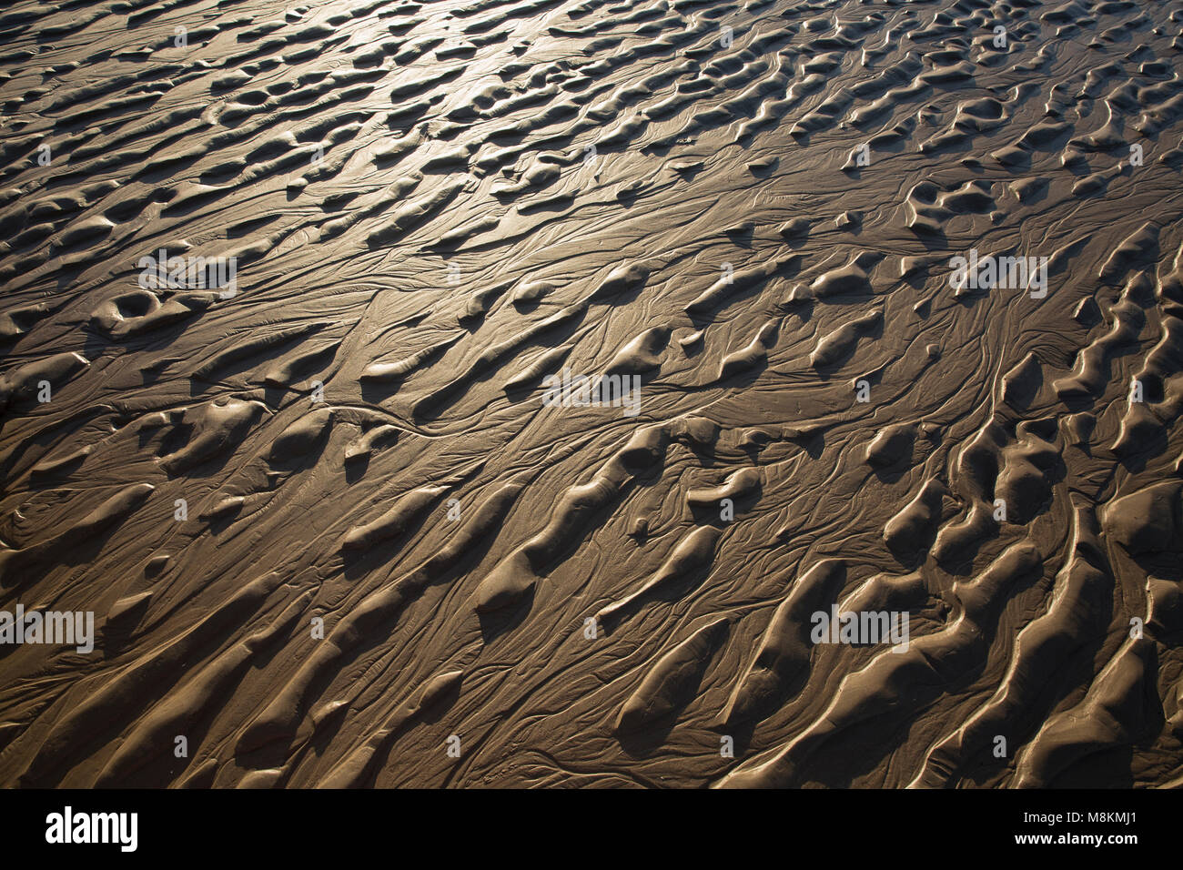 Modelli da sinistra il riflusso della marea di estuario in sabbia, vicino a Jenny Brown's punto, Morecambe Bay, a nord-ovest Inghilterra UK GB Foto Stock