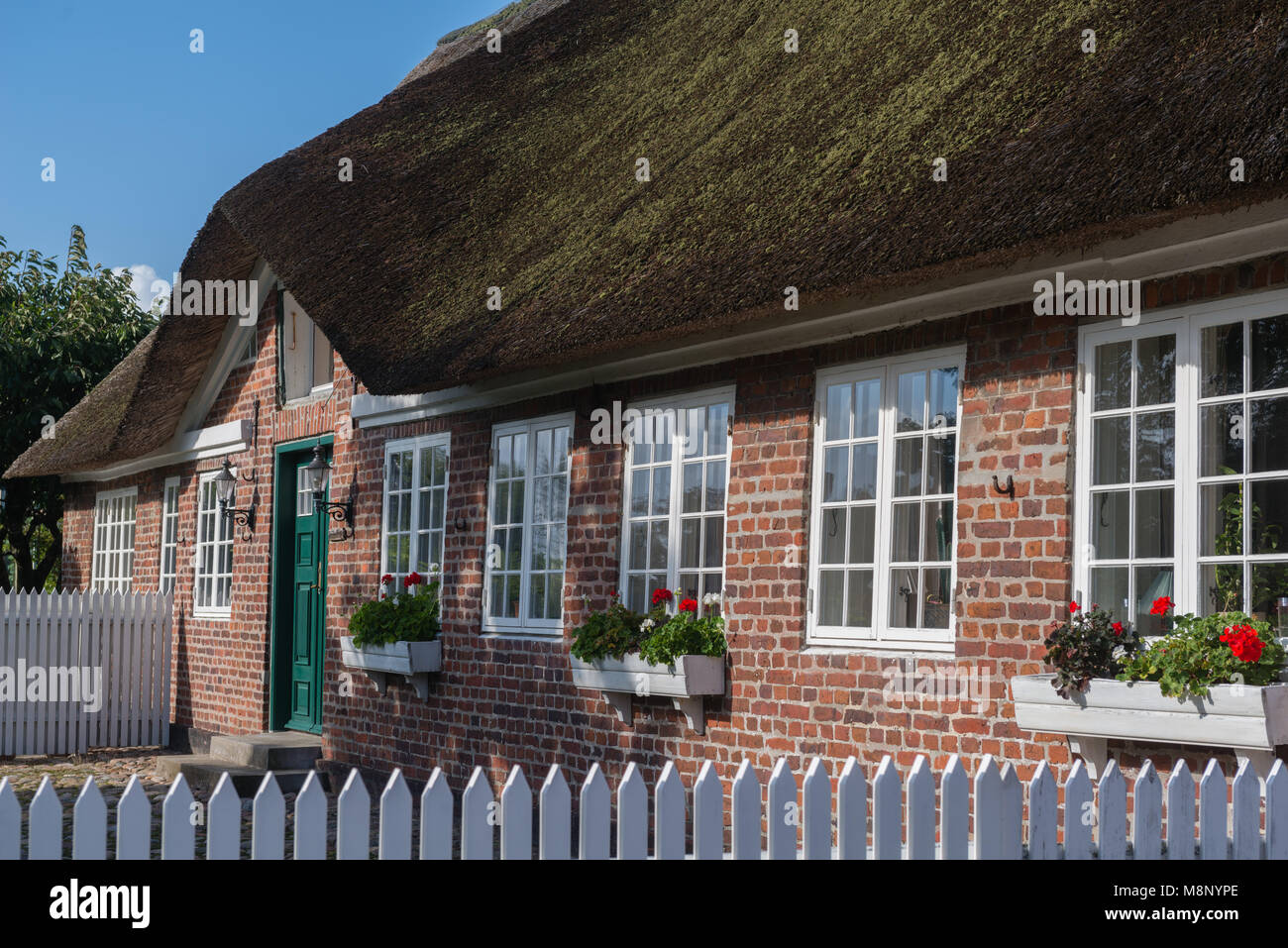 Tipica casa danese in Nordby, isola di Fanoe, nello Jutland, Danimarca Foto Stock