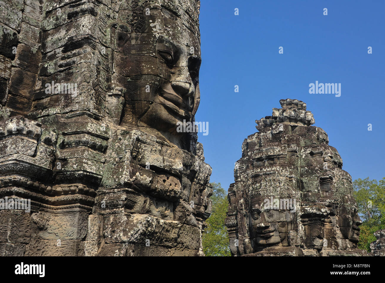 Il famoso "faccia torri" del tempio Bayon a Angkor Wat, Cambogia. Gigante torri gotiche (54 in totale), scolpita con l immagine di Avalokiteshvara Foto Stock