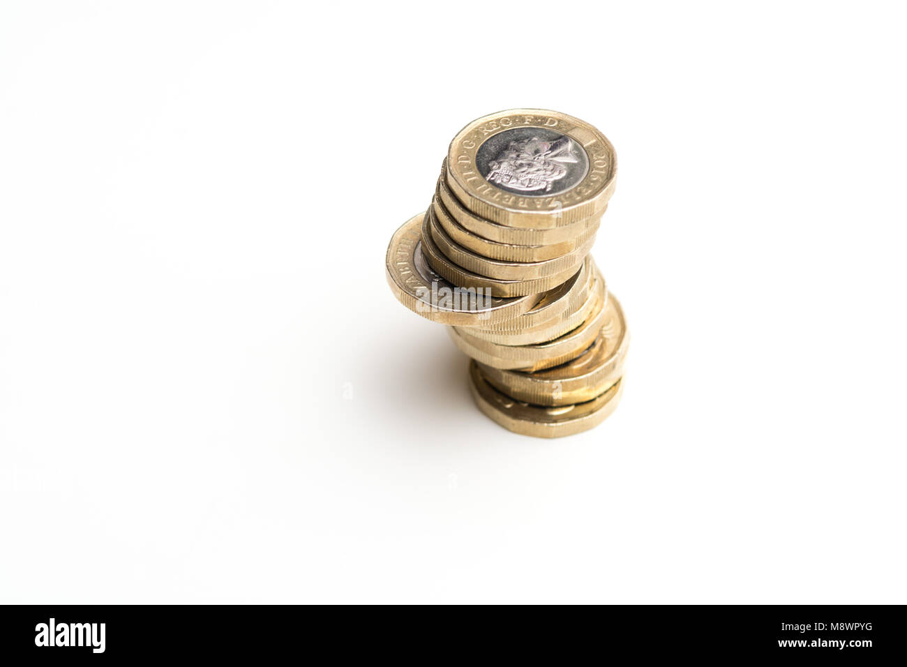 Monete isolati su sfondo bianco, la valuta britannica Foto Stock