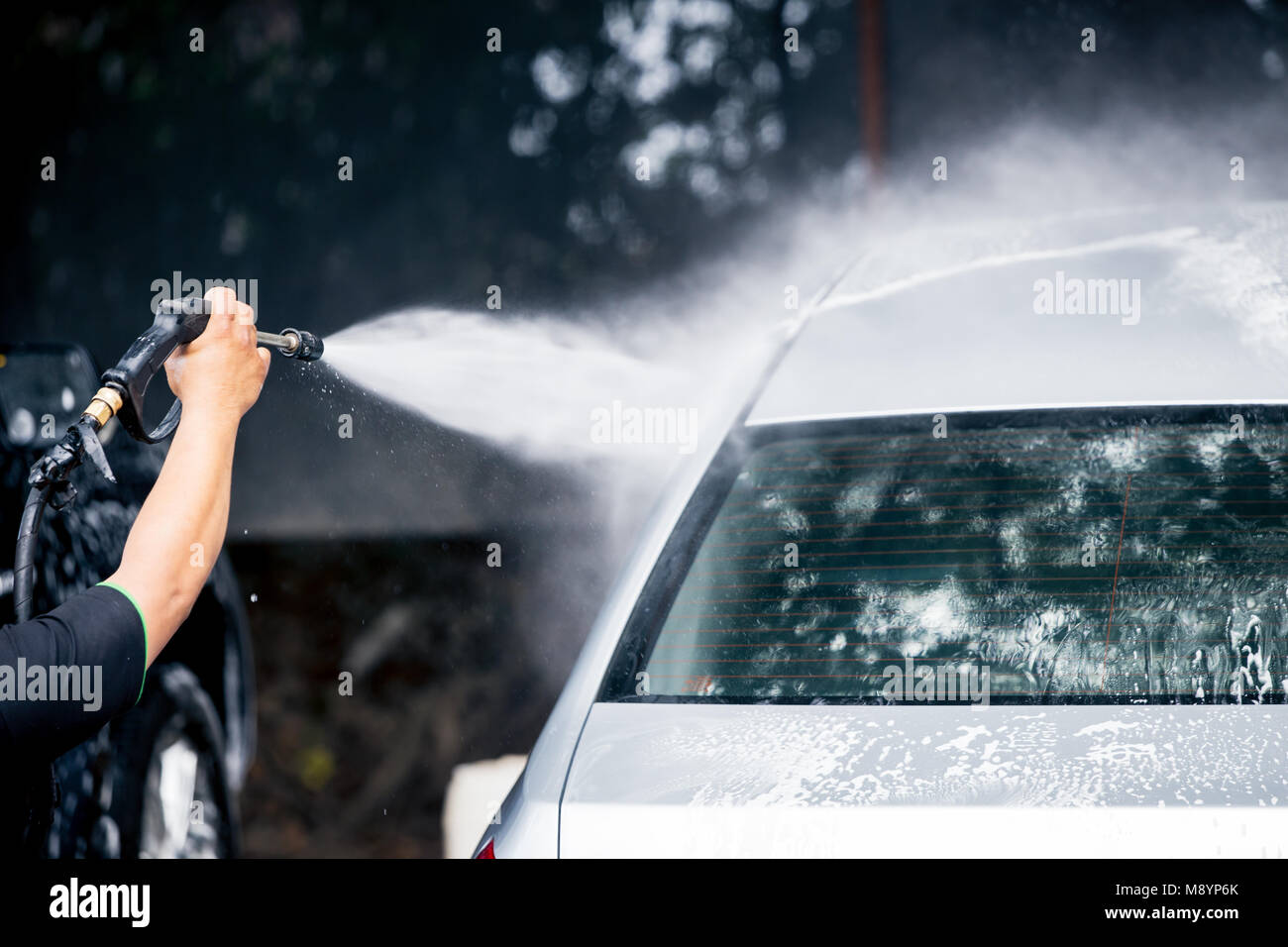 Pulizia cura auto con acqua ad alta pressione cleaner Foto Stock