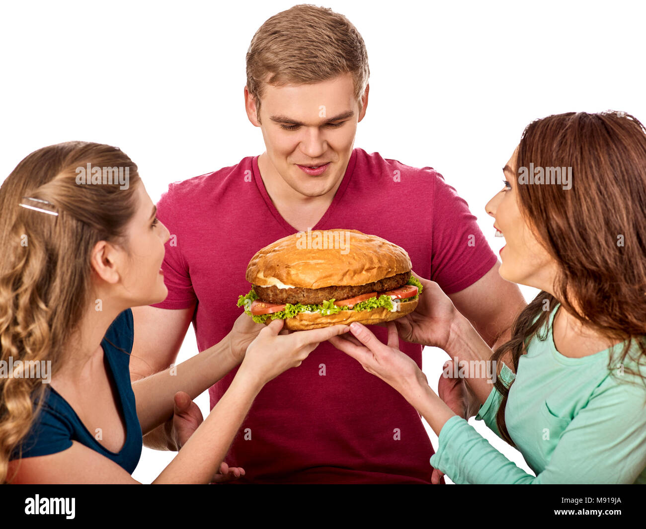 Hamburger fast food nelle persone amici mani. Foto Stock