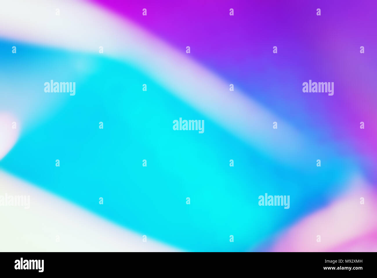Olografica neon ultravioletti unfocus astratto dello sfondo. Foto Stock
