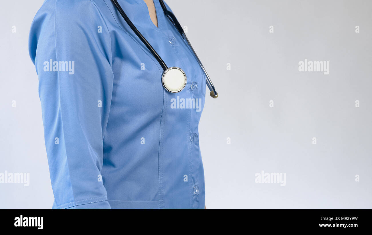 Medico donna con uno stetoscopio, ospedale lavoratore, consultazione del paziente, la diagnosi Foto Stock