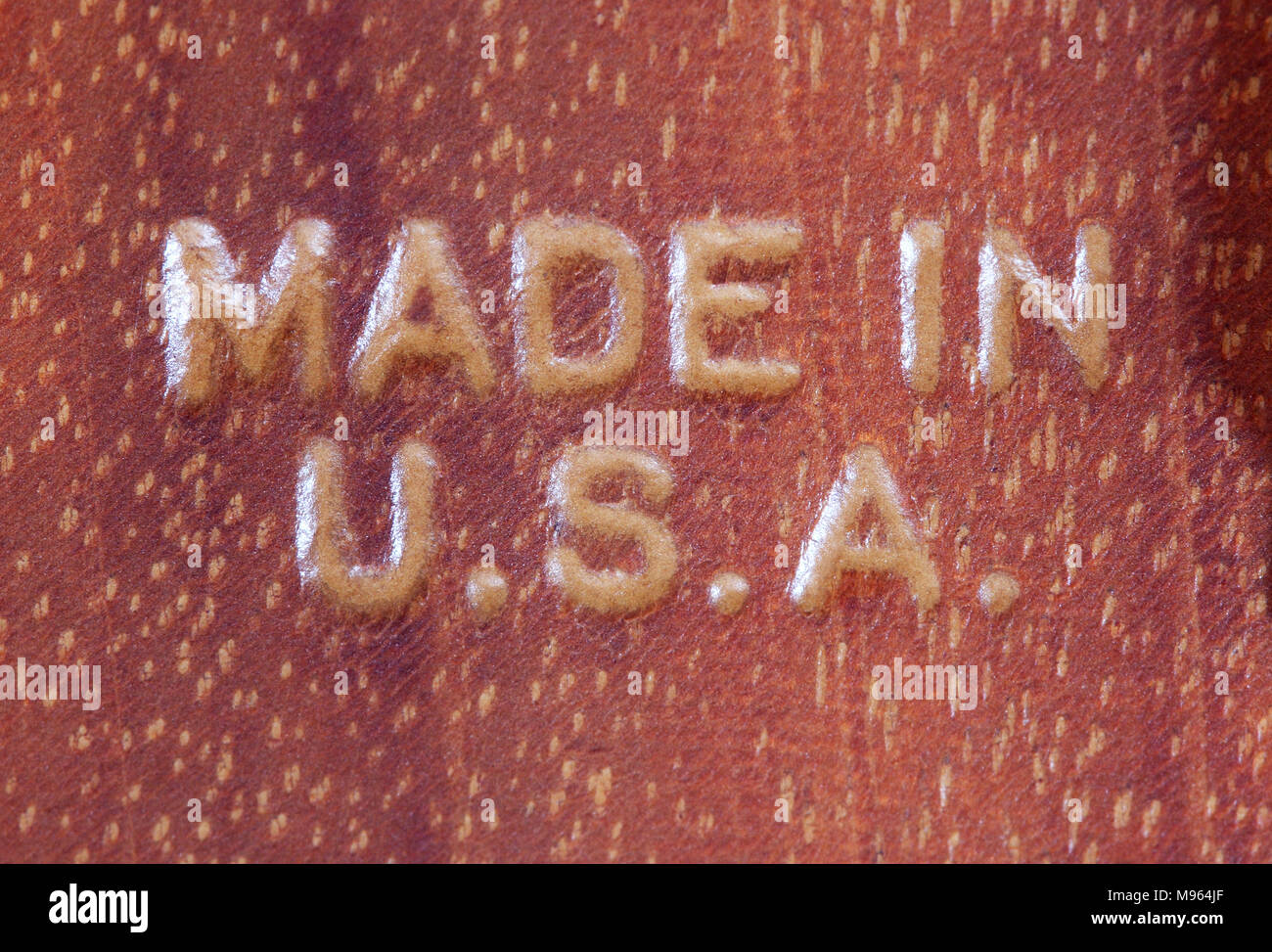 Testo realizzato negli Stati Uniti instradato in legno di mogano. Foto Stock