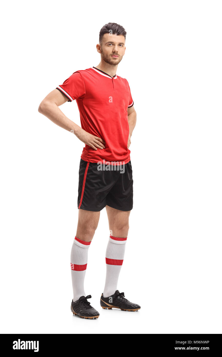 A piena lunghezza Ritratto di un giocatore di calcio isolati su sfondo bianco Foto Stock
