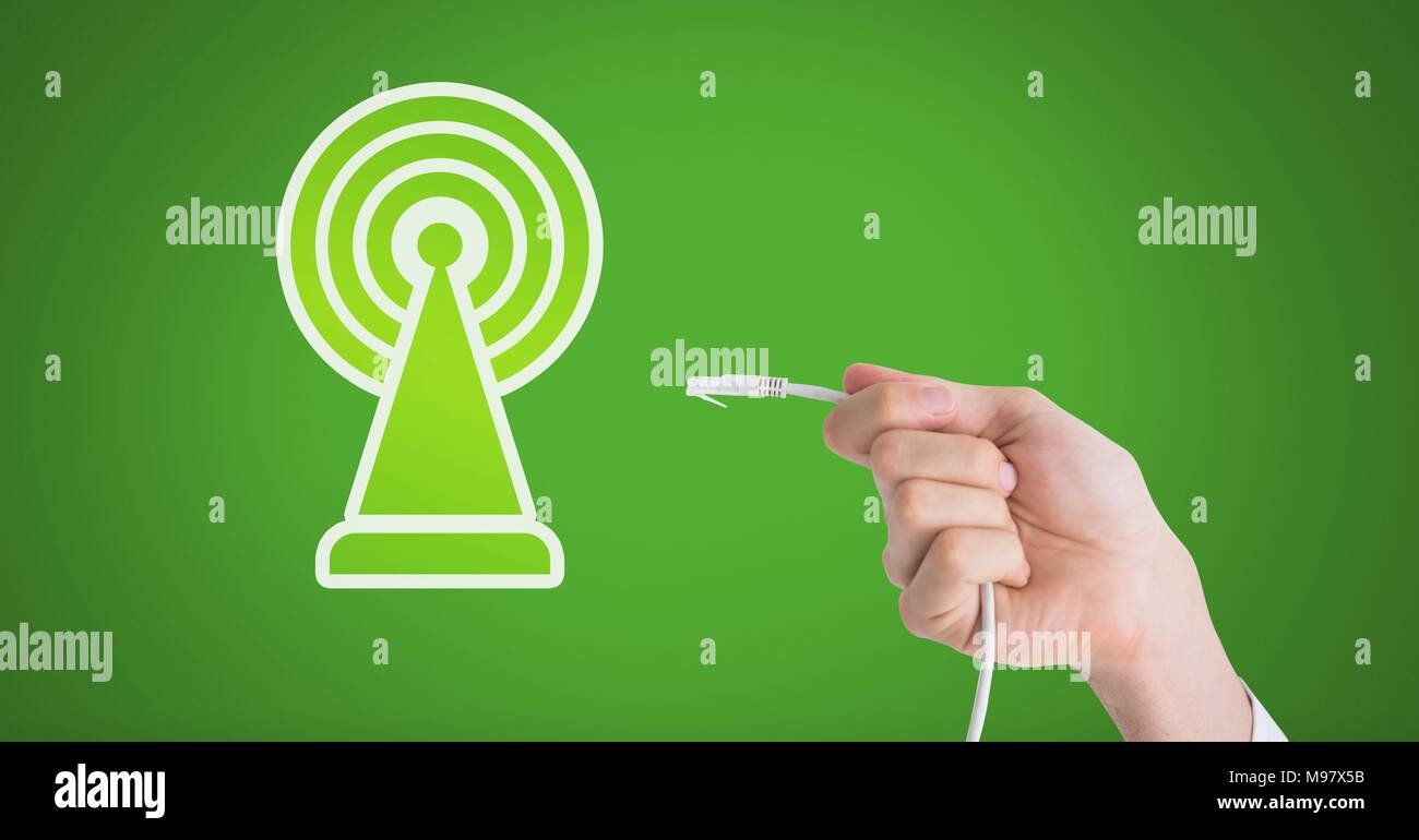 Mano che trattiene il filo connessione con rete di segnale Foto Stock