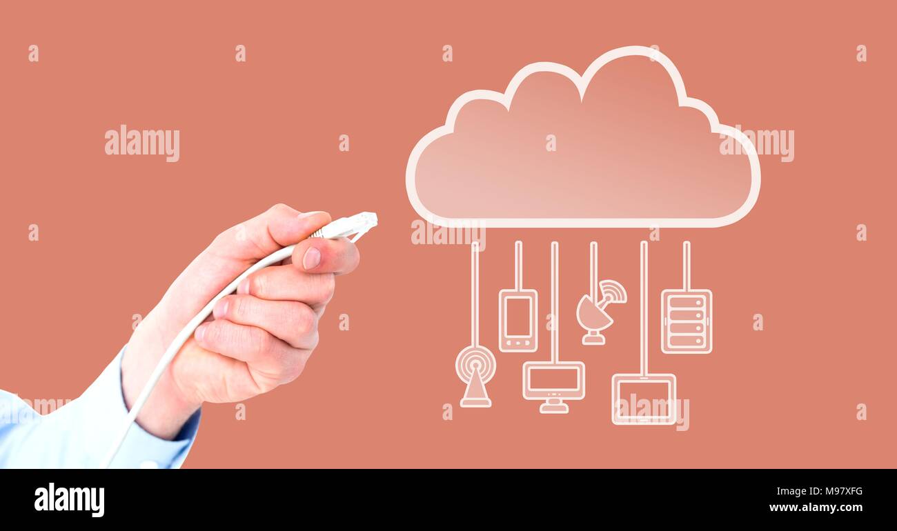 Mano che trattiene il filo collegamento con dispositivi di cloud Foto Stock