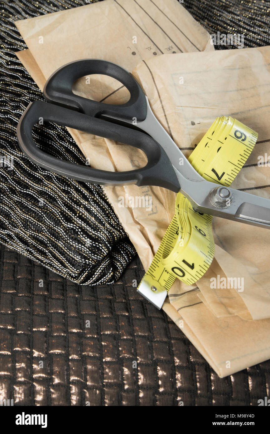 La cucitura con glittery tessuti Foto Stock