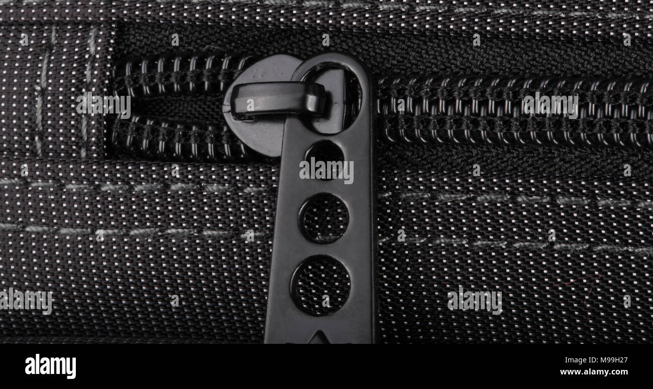 Borsa nera con puntini bianchi Foto Stock