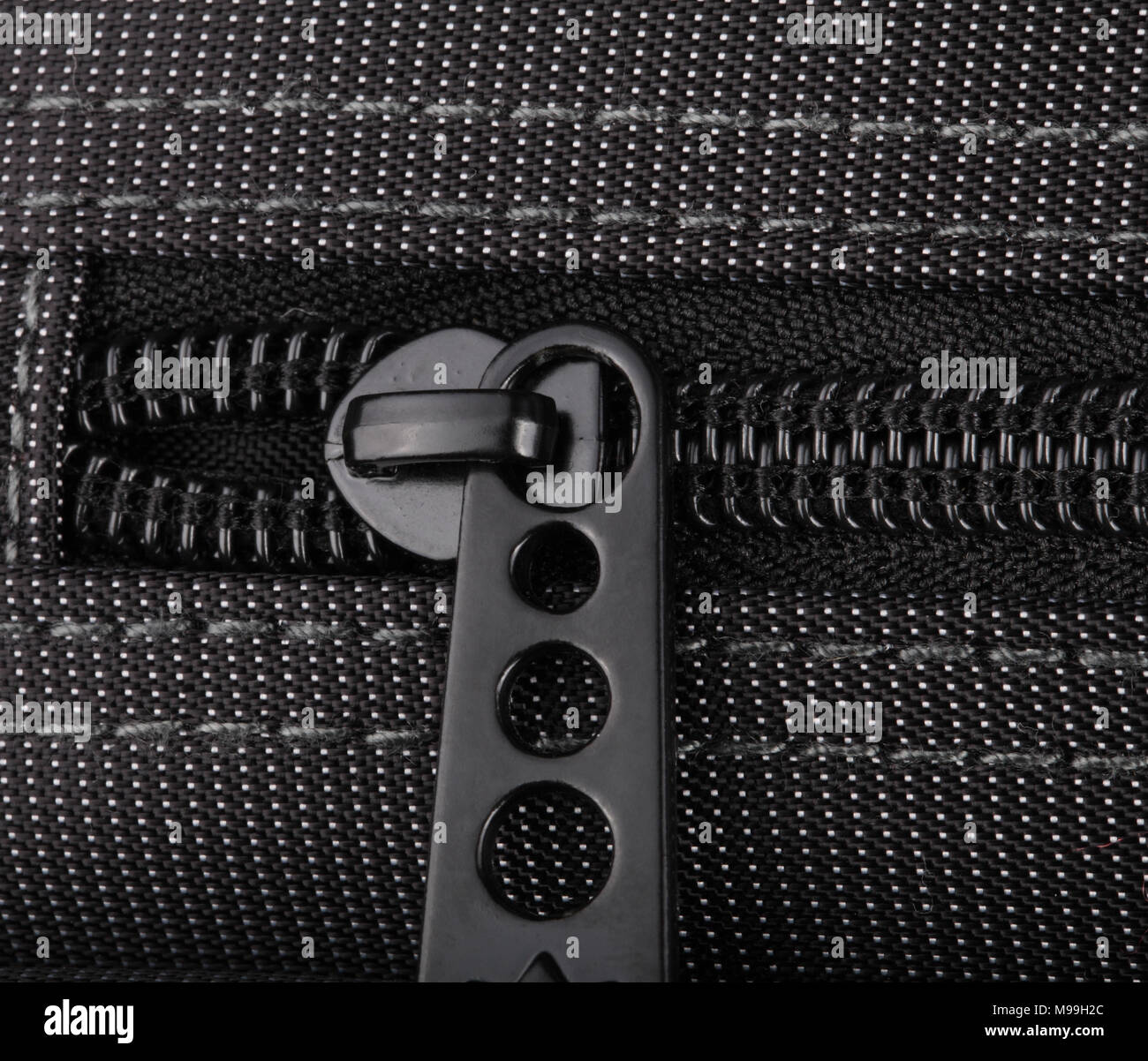 Borsa nera con puntini bianchi Foto Stock