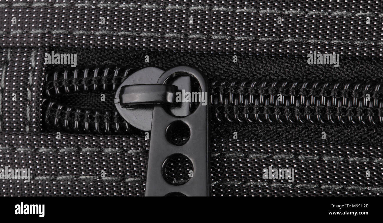 Borsa nera con puntini bianchi Foto Stock