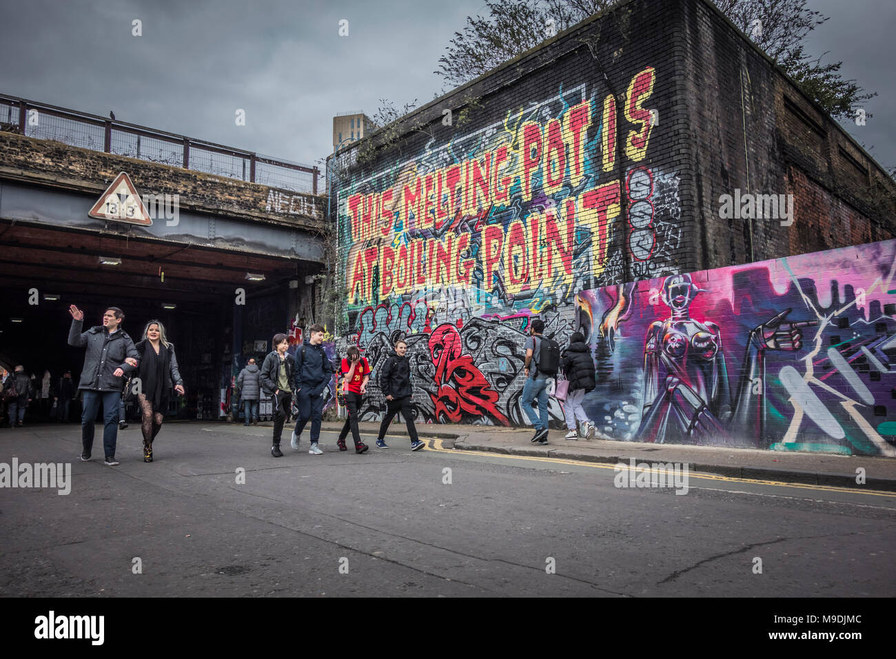 Melting Pot graffiti in Spitalfields in East End di Londra, Regno Unito Foto Stock