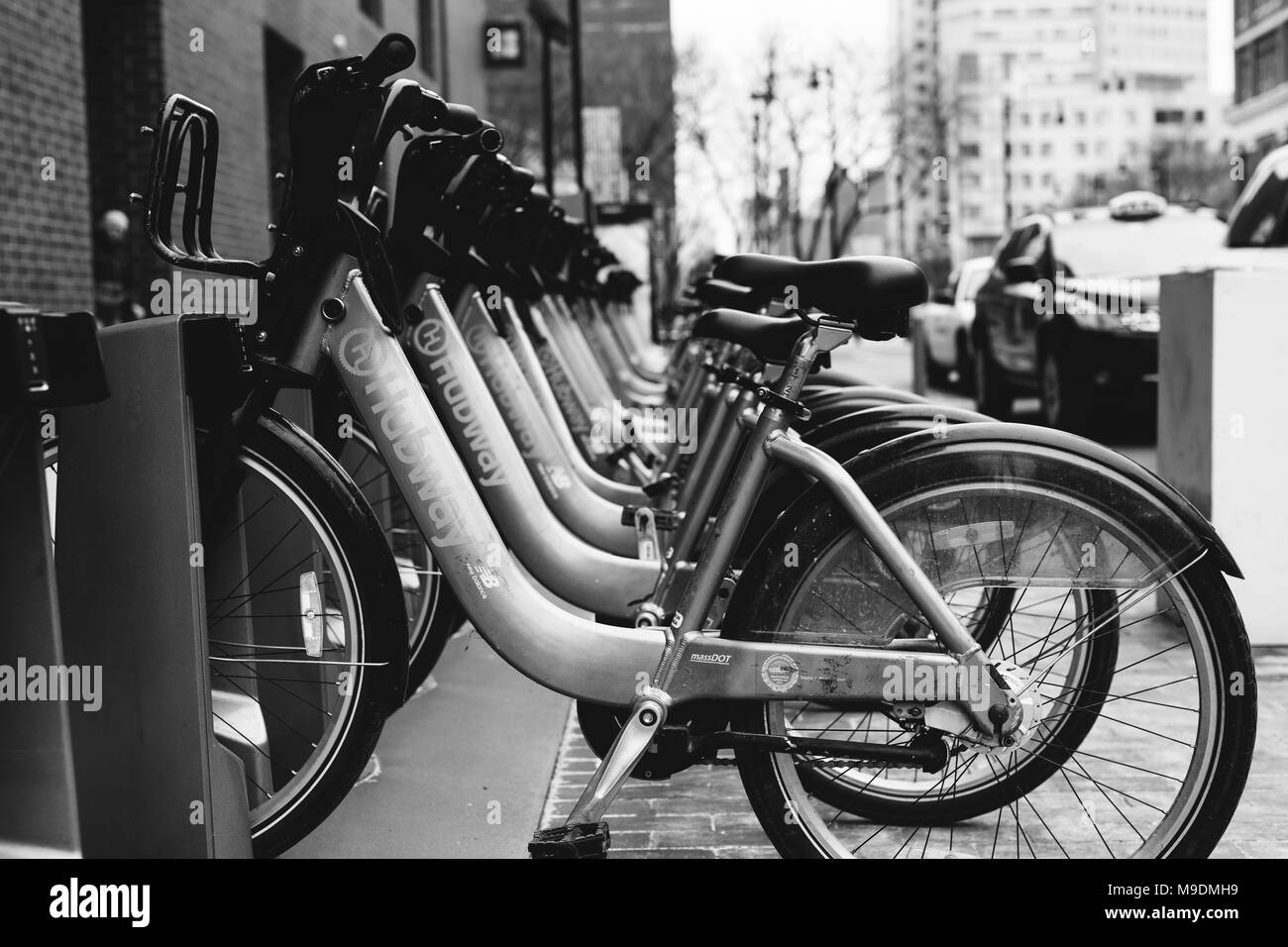 Noleggio bici su un rack a Kendall Square a Cambridge, Massachusetts. Foto Stock