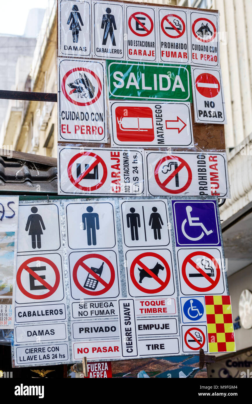 Buenos Aires Argentina,insegne,mostra vendita simboli universali,divieto,lingua spagnola,uomini,donne,privato,disabili disabili speciali necessità non smoki Foto Stock