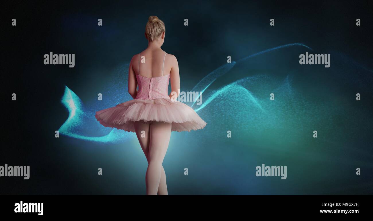 Ballerina ballando con digital luci incandescenti Foto Stock