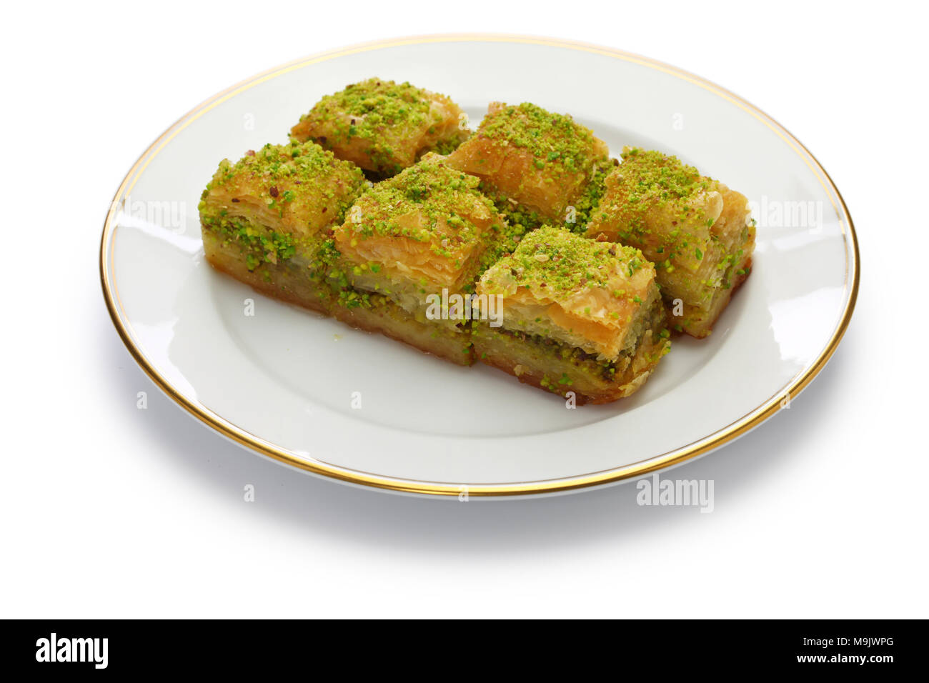 Il pistacchio baklava, fistikli baklava, turco dessert tradizionale isolato su sfondo bianco Foto Stock