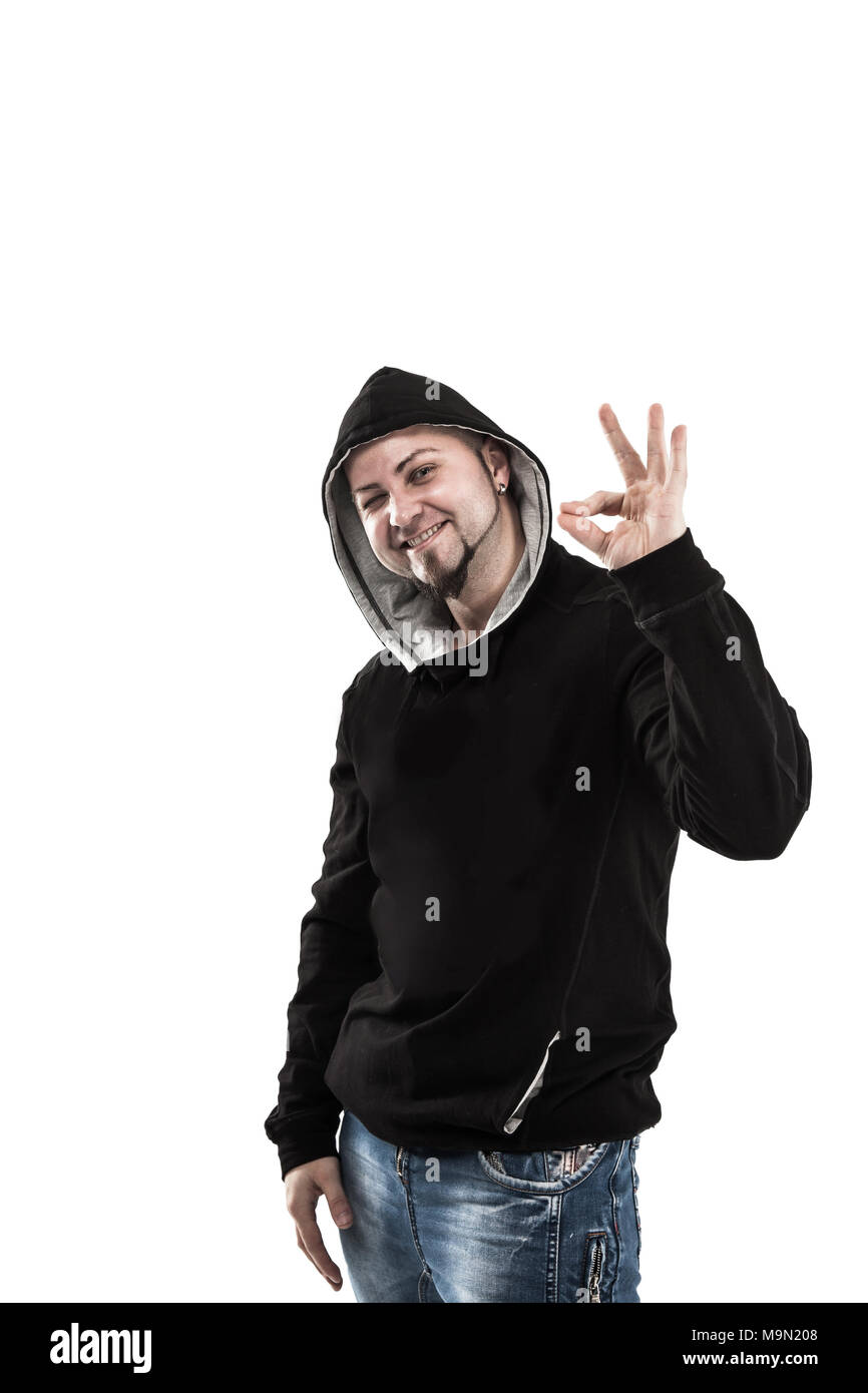 Carismatico rapper ragazzo mostra una mano segno OK Foto Stock