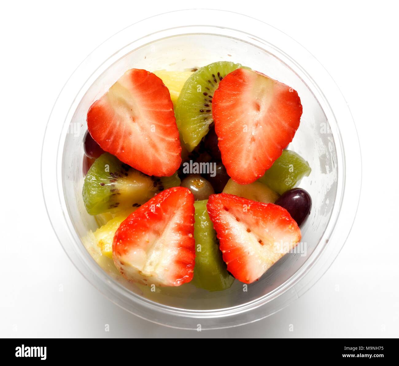 Fragole kiwi uve ananas frutta pot Foto Stock