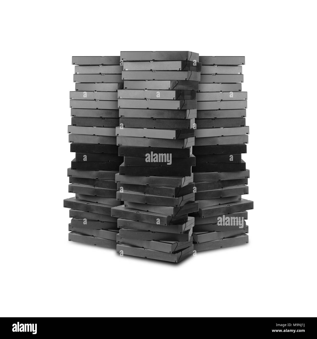 Tre montagne dal videotape su uno sfondo bianco. Essa è isolata, il lavoratore di percorsi è presente Foto Stock