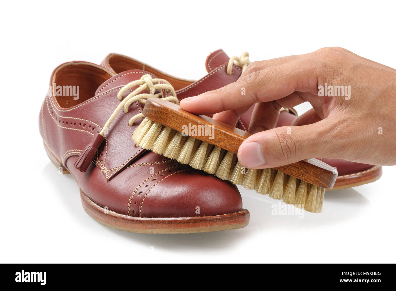 La spazzola di crine per scarpe in cuoio di lucidatura. Foto Stock