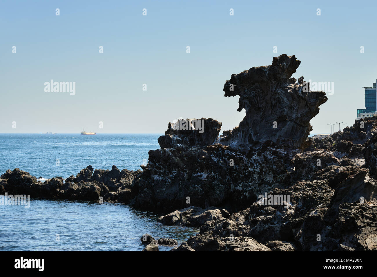 Yongduam Rock. Yongduam è una testa di drago-come rock e di una delle famose attrazioni vicino jeju city. Foto Stock