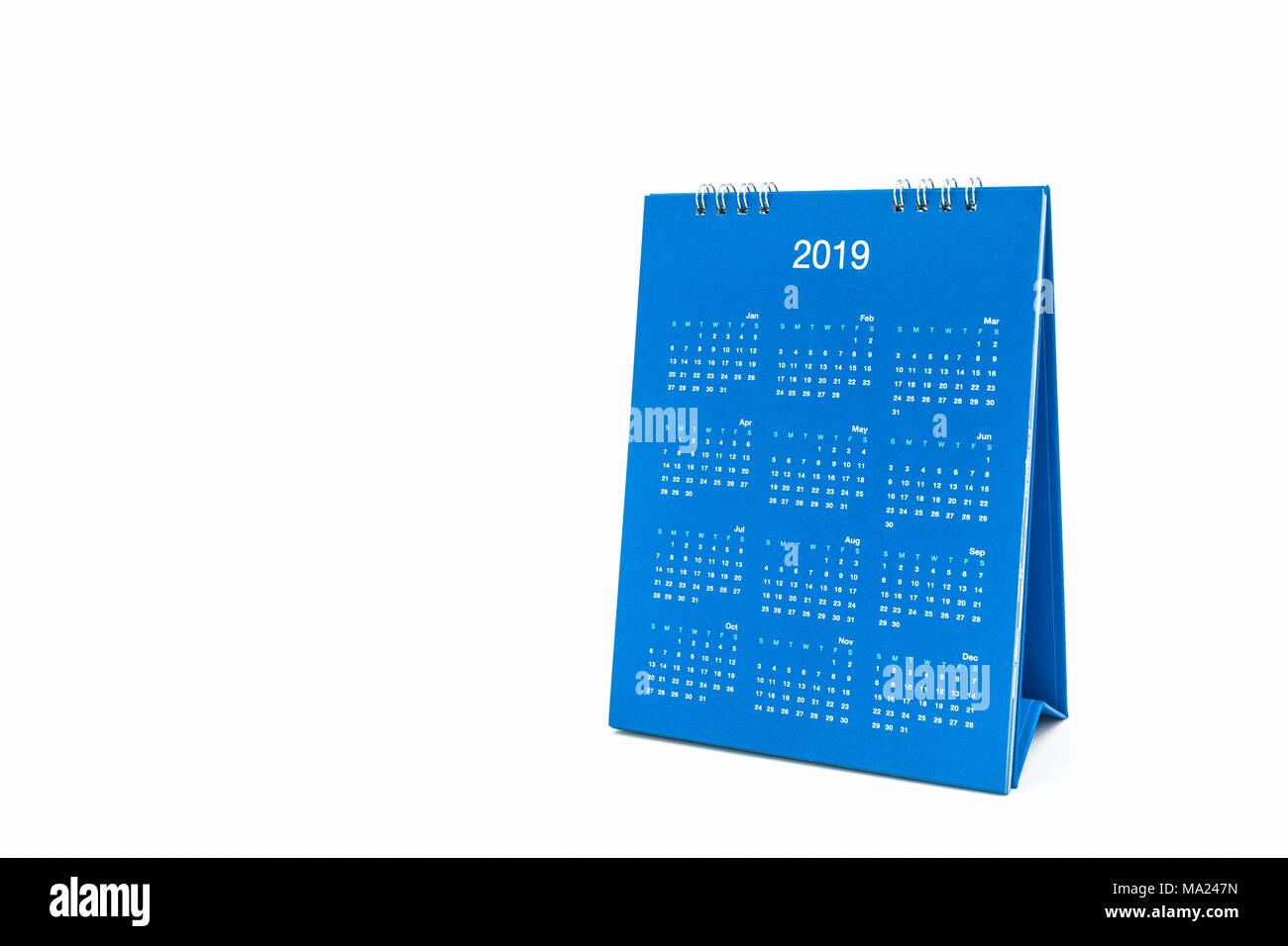 Carta desk calendario a spirale 2019 su sfondo bianco. Foto Stock