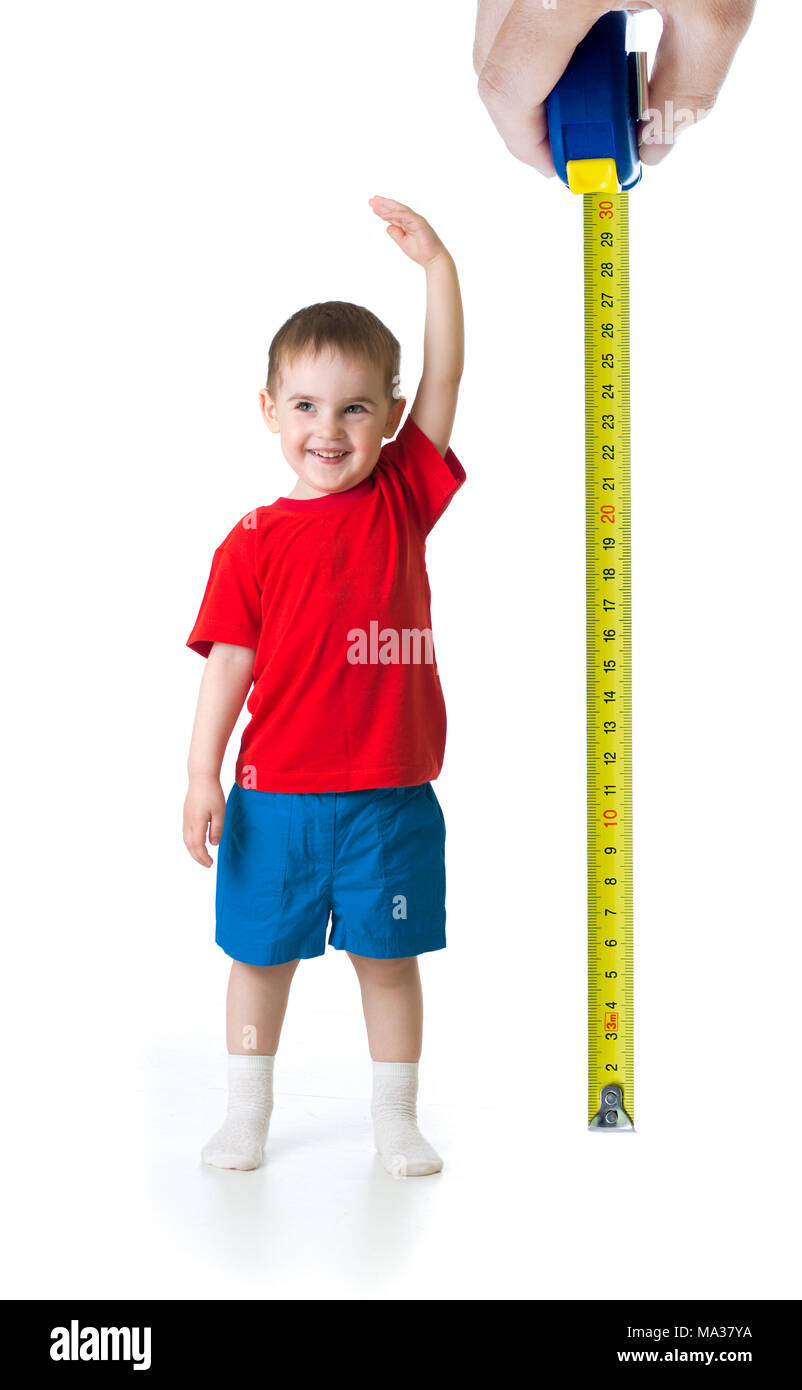 Kid crescente misura con righello Foto Stock