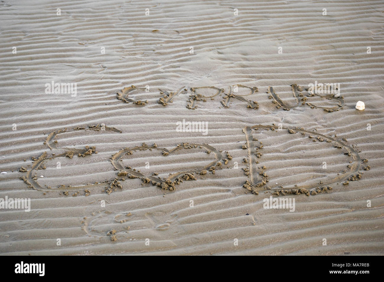 Lettere sulla sabbia Cipro AMORE E e D Foto Stock