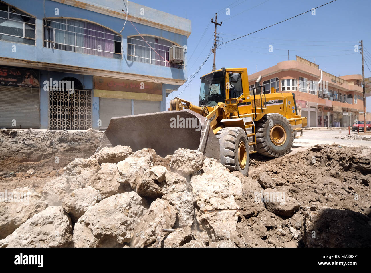 La ricostruzione dopo la distruzione da ISIS (SI) nel villaggio di Teleskuf nella pianura di Ninive, nel nord Iraq, Curdo Regione Autonoma Foto Stock