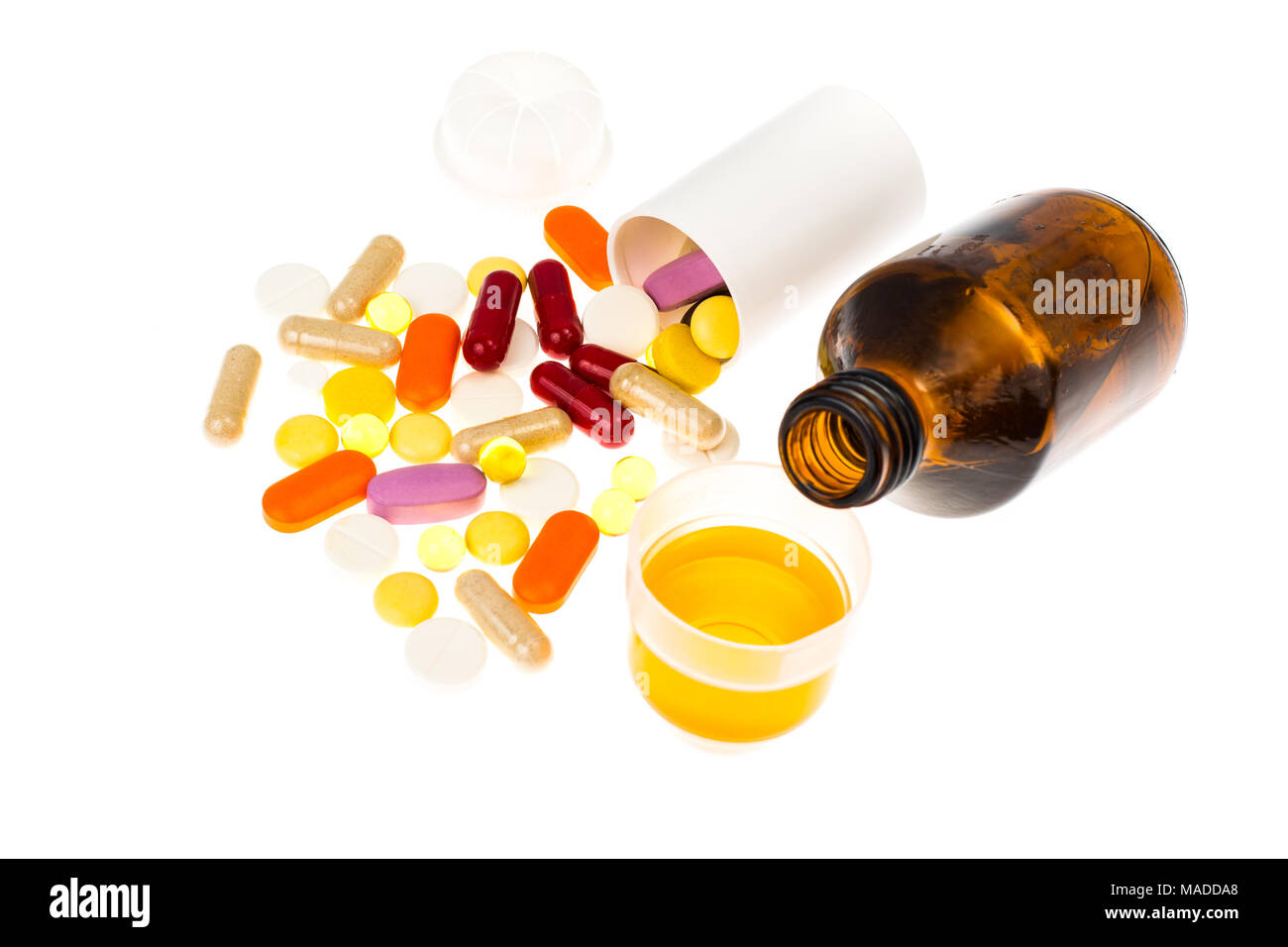 Compresse e sciroppi forme di farmaco. Foto Studio Foto Stock