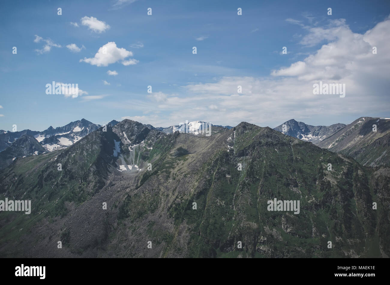 Green Hill e rock in ghiaccio Foto Stock