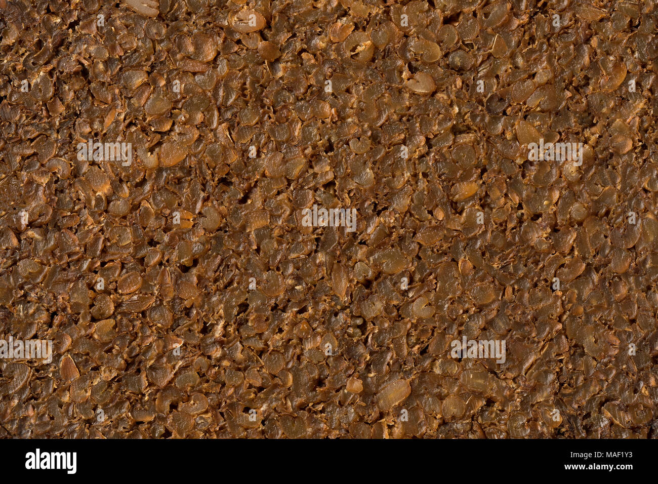 Scuro organico fresco pane di segale full frame close up Foto Stock