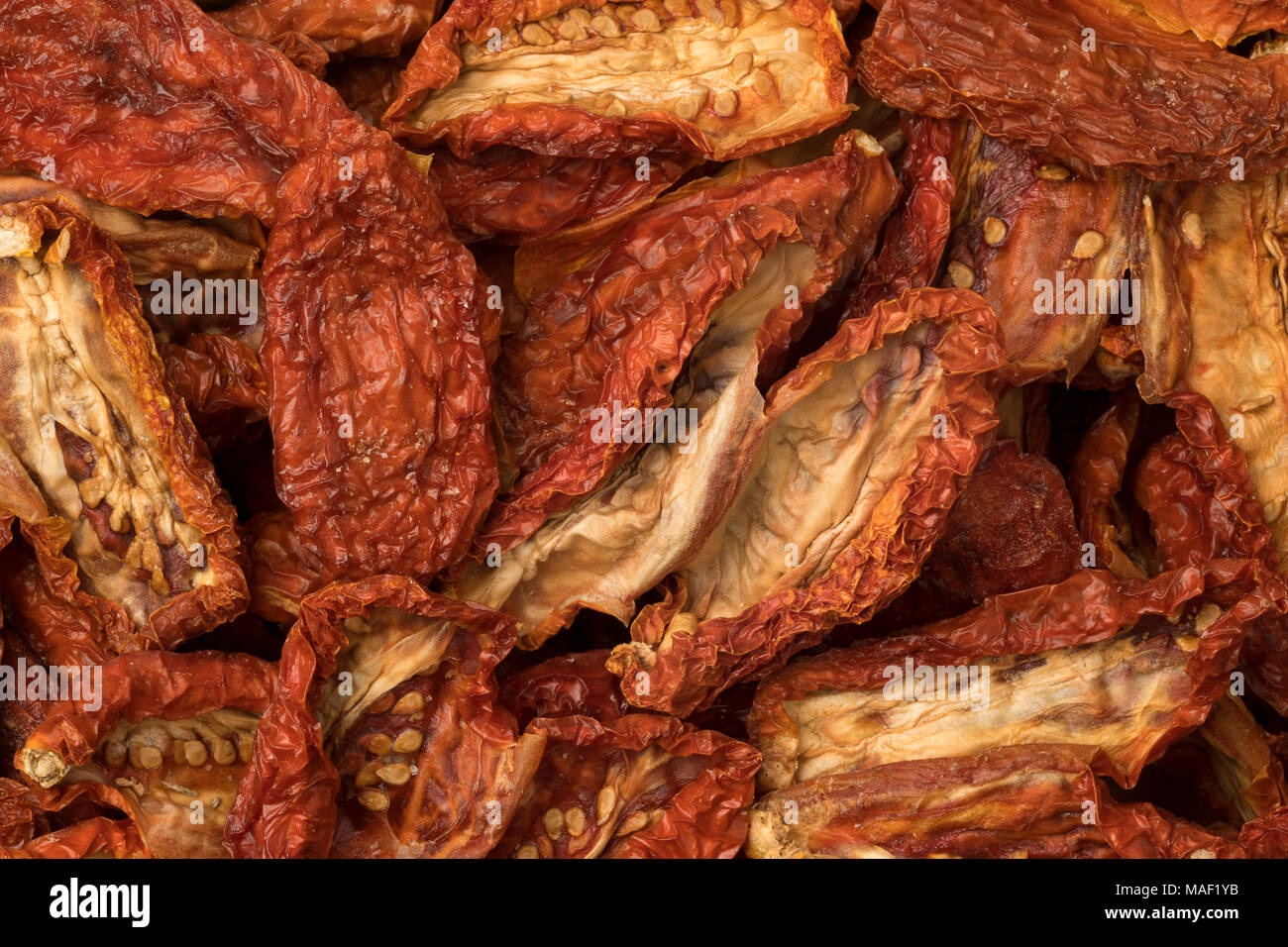 Pomodori secchi full frame close up Foto Stock