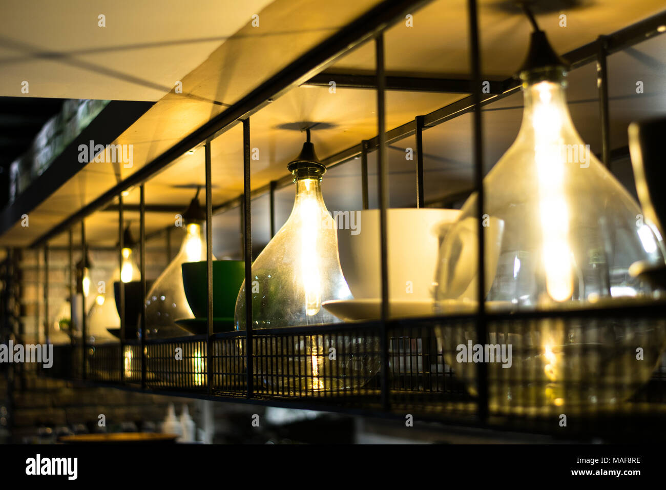 Coffee shop illuminazione artistico Foto Stock