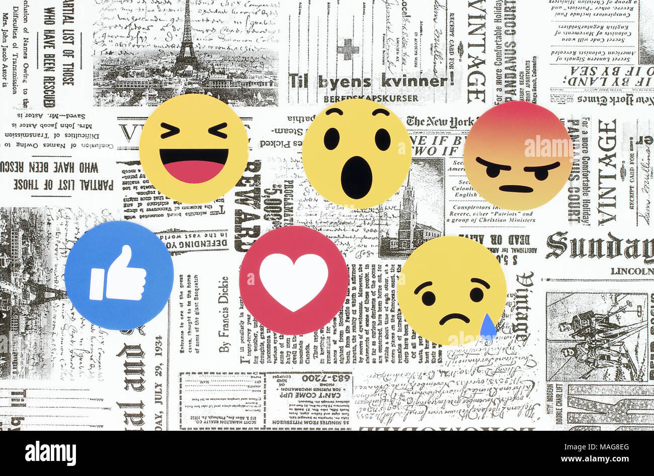 Kiev, Ucraina - Febbraio 08, 2018: Facebook Like Button 6 empatici reazioni Emoji stampato su carta e posto sul retro dello sfondo quotidiano. Facebo Foto Stock