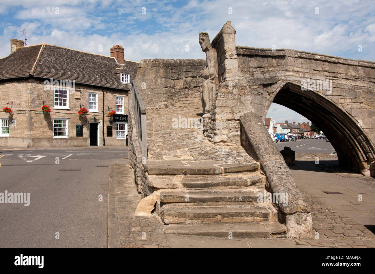 Il ponte medievale e monumento parte della medievale Abbazia Croyland cancelli in Crowland, Lincolnshire Foto Stock