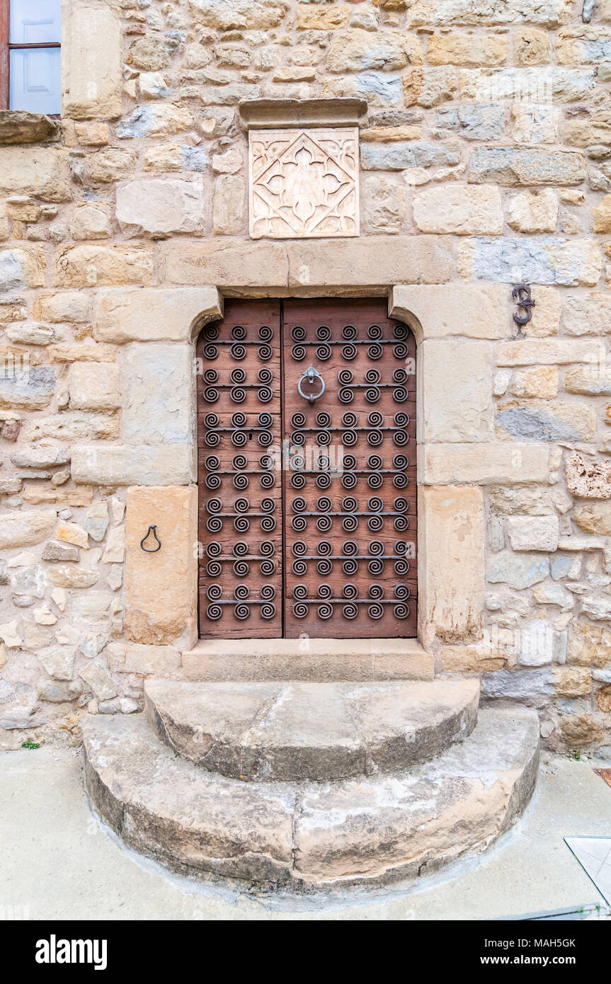 Ghisa ornamenti della porta, porta, ingresso, pietra Foto Stock