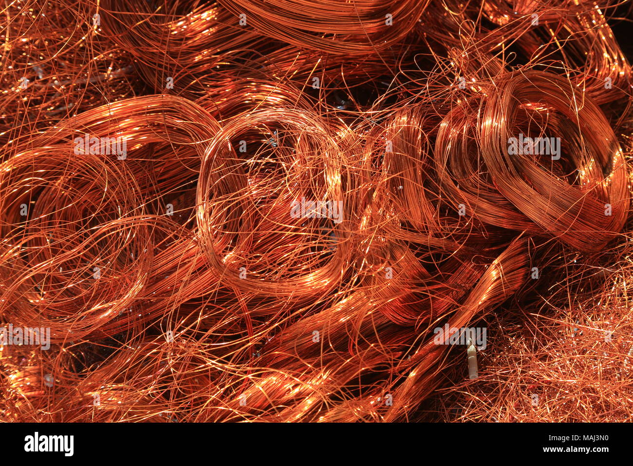 Filo di rame per i rottami ammucchiati Foto Stock