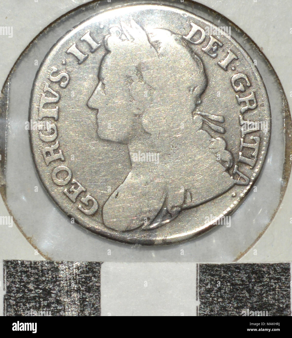 Argento britannico uno scellino Coin con un giovane immagine del re George II. Titolo: argento britannico uno scellino moneta . 1739. Foto Stock
