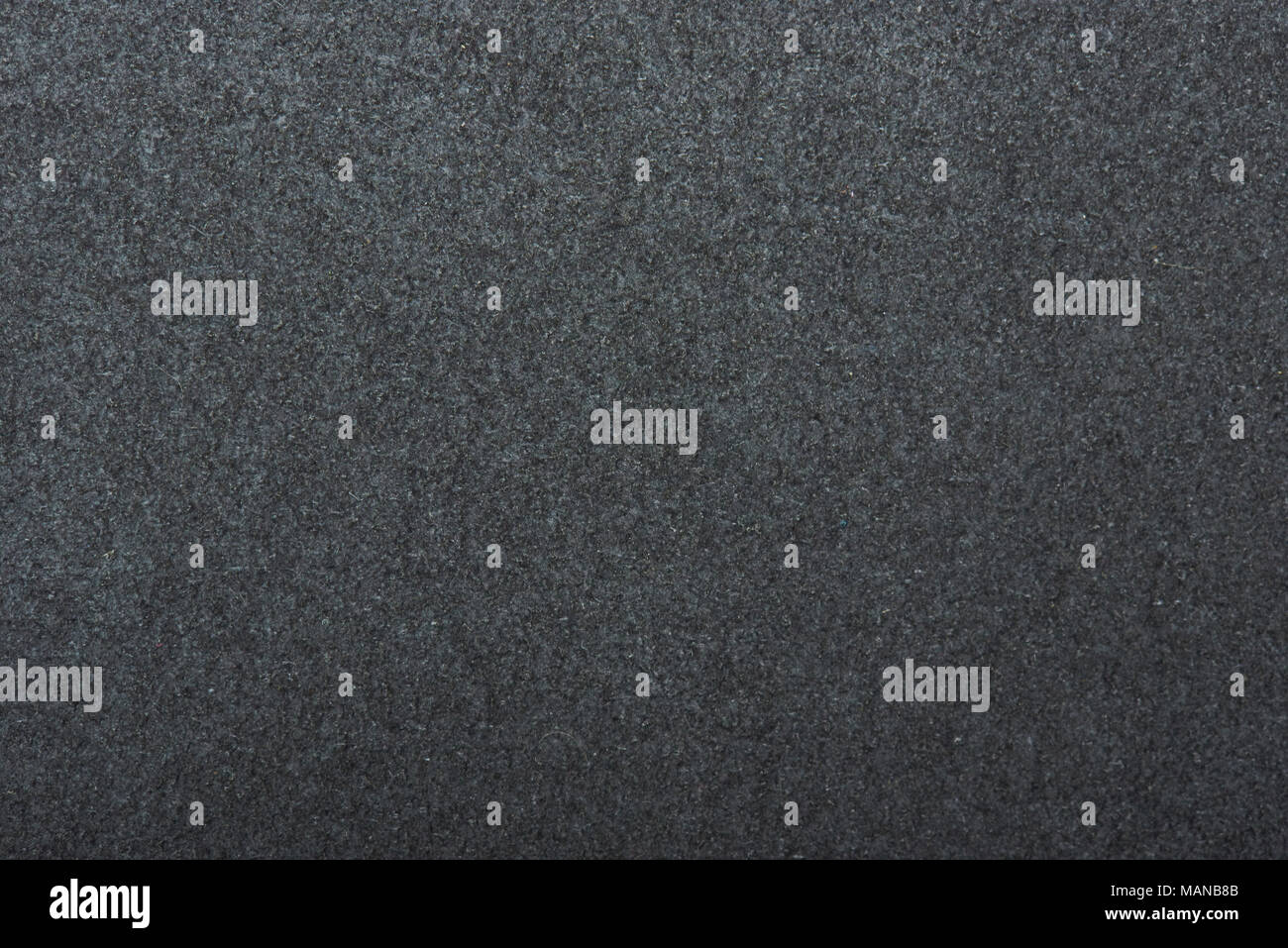 Primo piano della texture alcantara. Modello di colore grigio della superficie del materiale Foto Stock