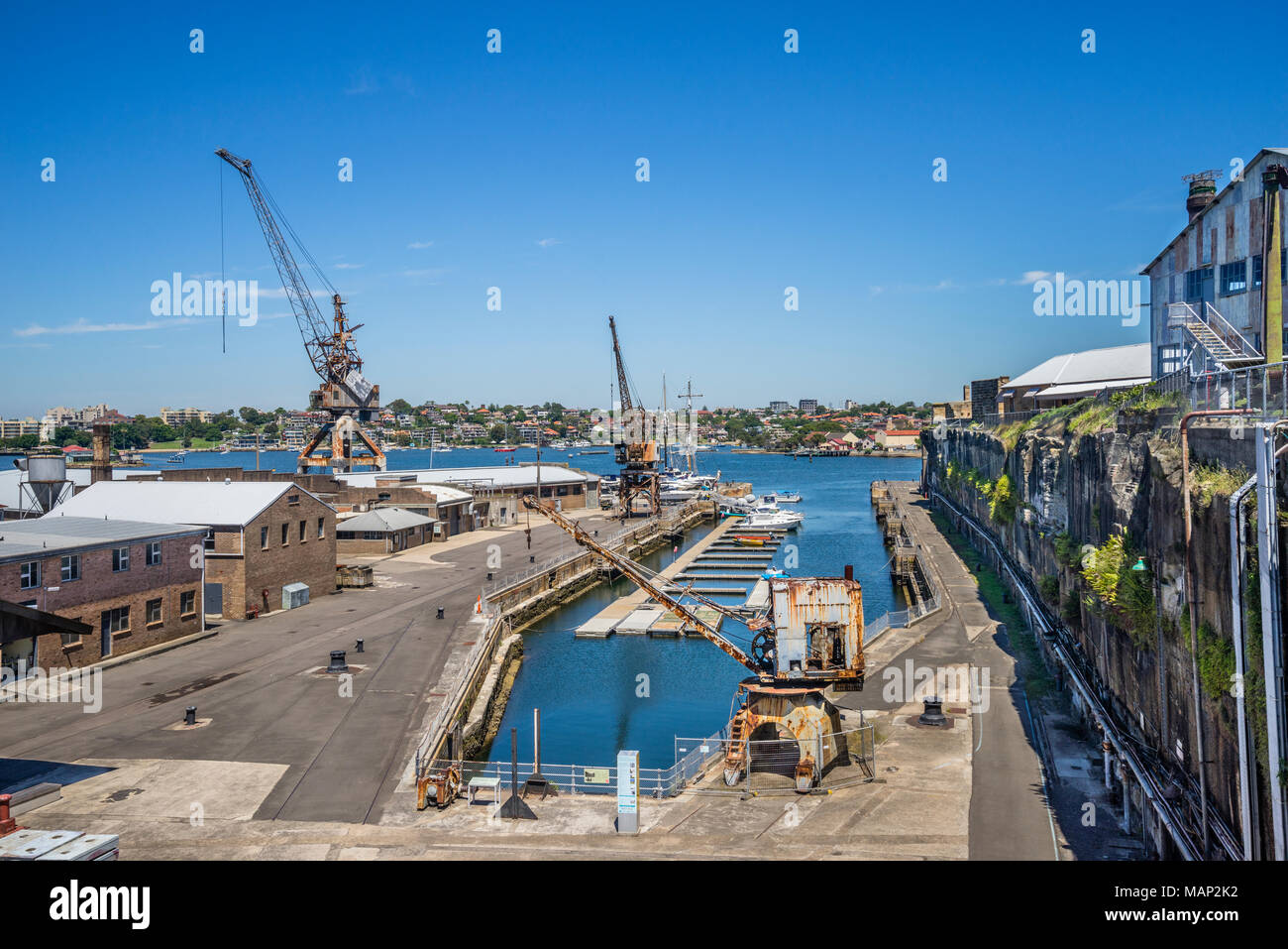 Vista di Sutherland Dock, la Cockatoo Island cantiere heritage site, Porto di Sydney, Nuovo Galles del Sud, Australia Foto Stock