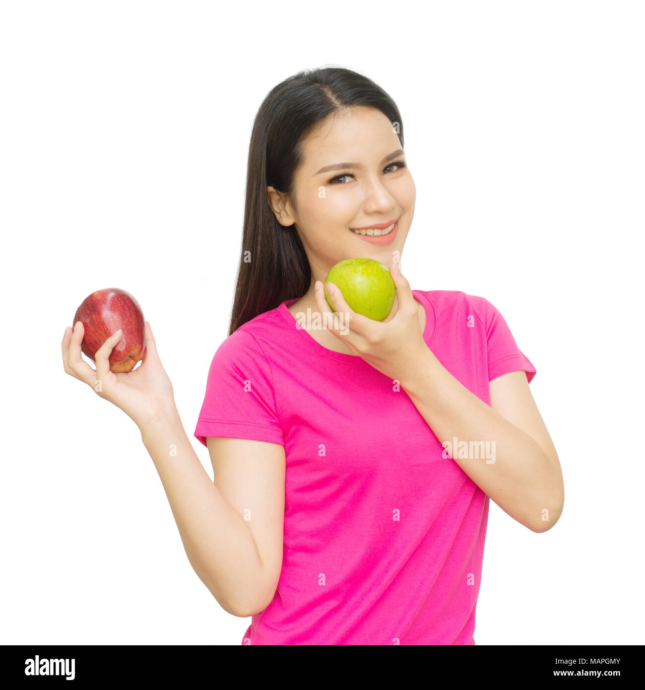 Ragazza salute visualizza rosso e verde mela con faccia sorridere isolato su sfondo bianco, mangiare sano concetto alimentare Foto Stock