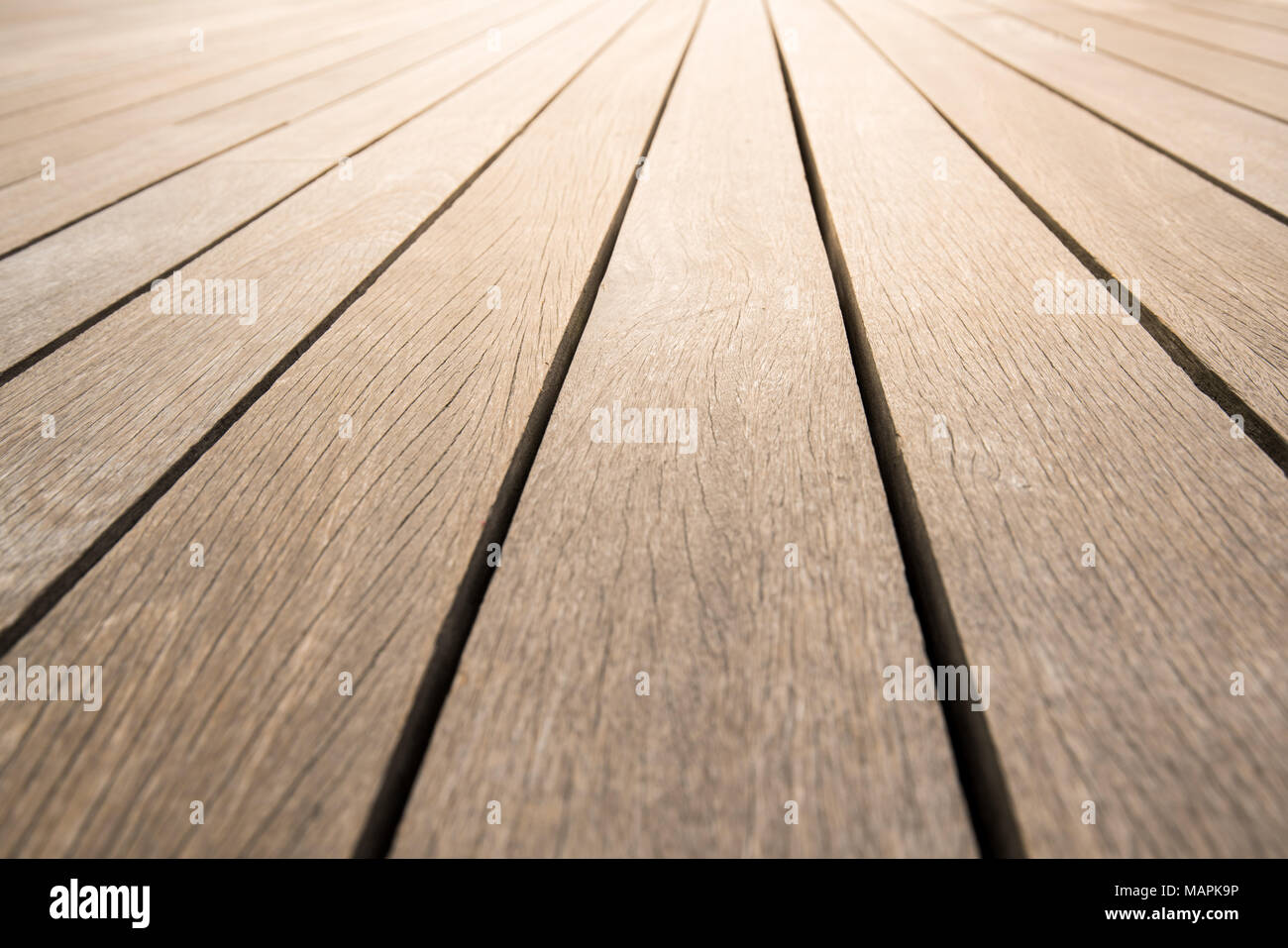 Brown il pavimento di legno di sfondo in prospettiva Foto Stock